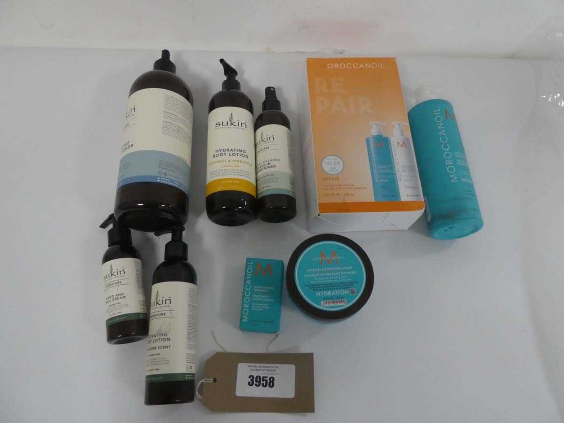 +VAT A bag containing Moroccan oil and sukin products