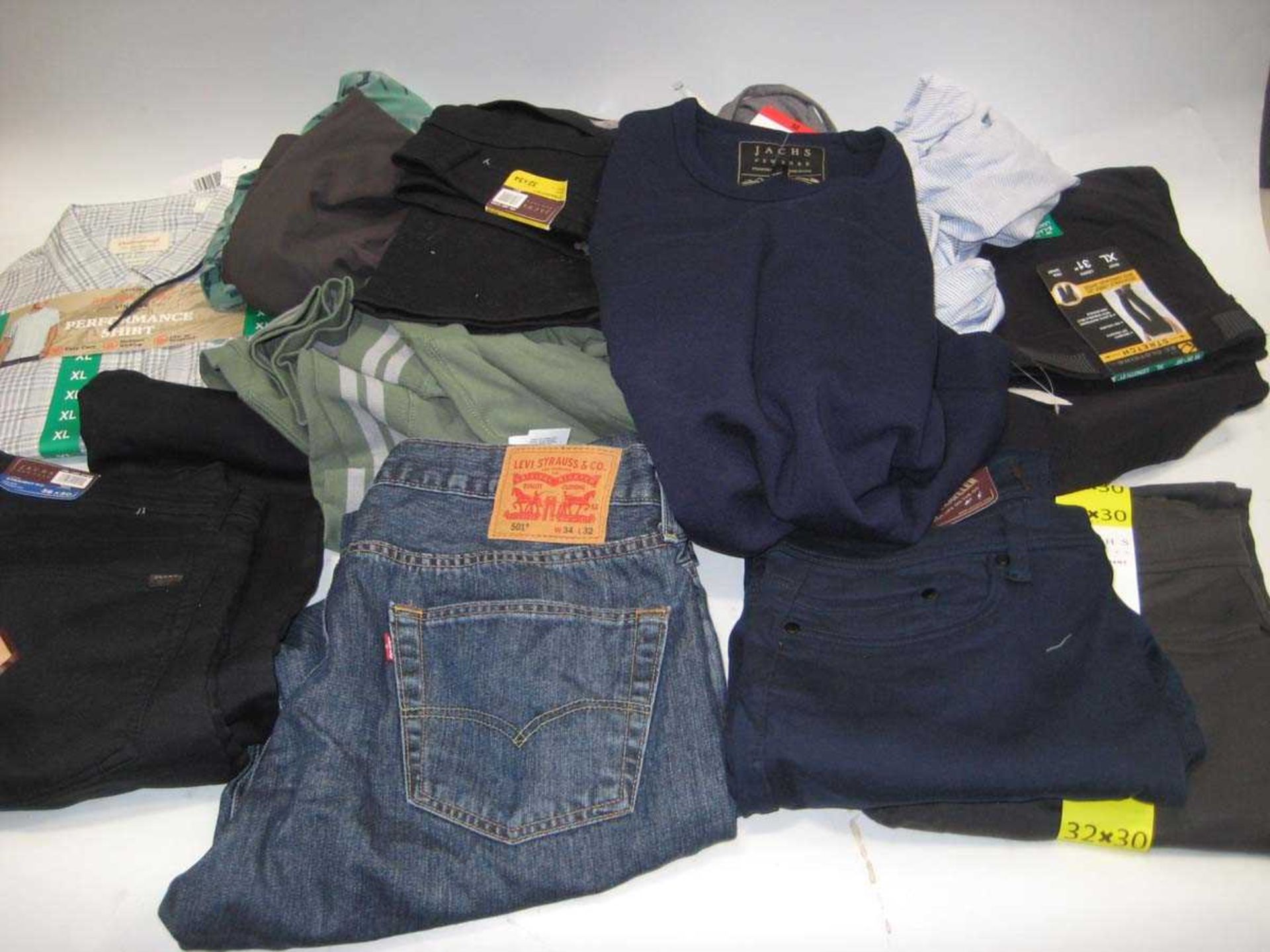 +VAT A bag containing Men's Clothing in various styles and sizes, including Levis.