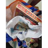 Bag with a quantity of board games and dolls