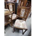Pair of oak floral patterned dining chairs