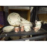 Cage containing Lotus Leaf patterned crockery and a small quantity of export china