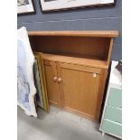 Oak double door cupboard with shelf over