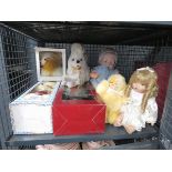 Cage containing childrens dolls