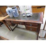 Oak desk with green leather surface