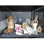 Cage containing ornamental boots, copper and brass candlestick, clock, jug, teapot and ornamental