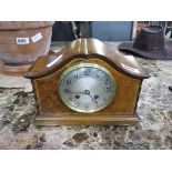 Mantle clock in walnut case