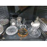 Cage containing a quantity of glassware to include clocks, photo frames, tray and a table lamp