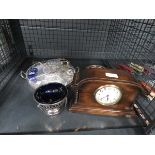 Cage containing a mantle clock, silver plated coaster, loose cutlery, scent bottles, thimbles and