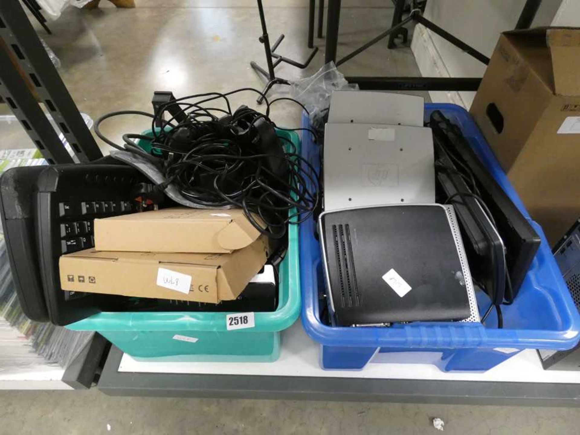 2 boxes containing various IT sundries, HP mini client computers, keyboards and other accessories