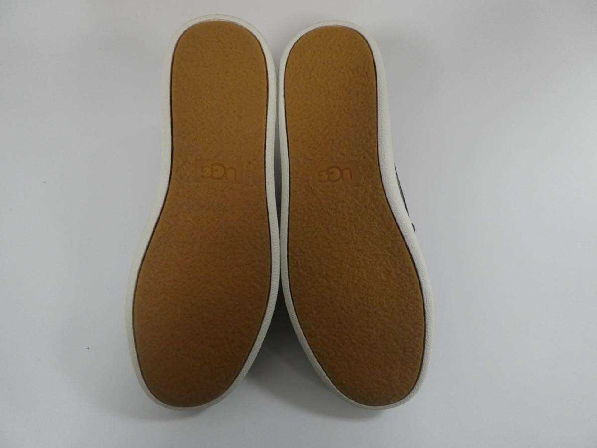 +VAT Boxed pair of UGG slip on shoes in black / silver size UK5 - Image 4 of 4