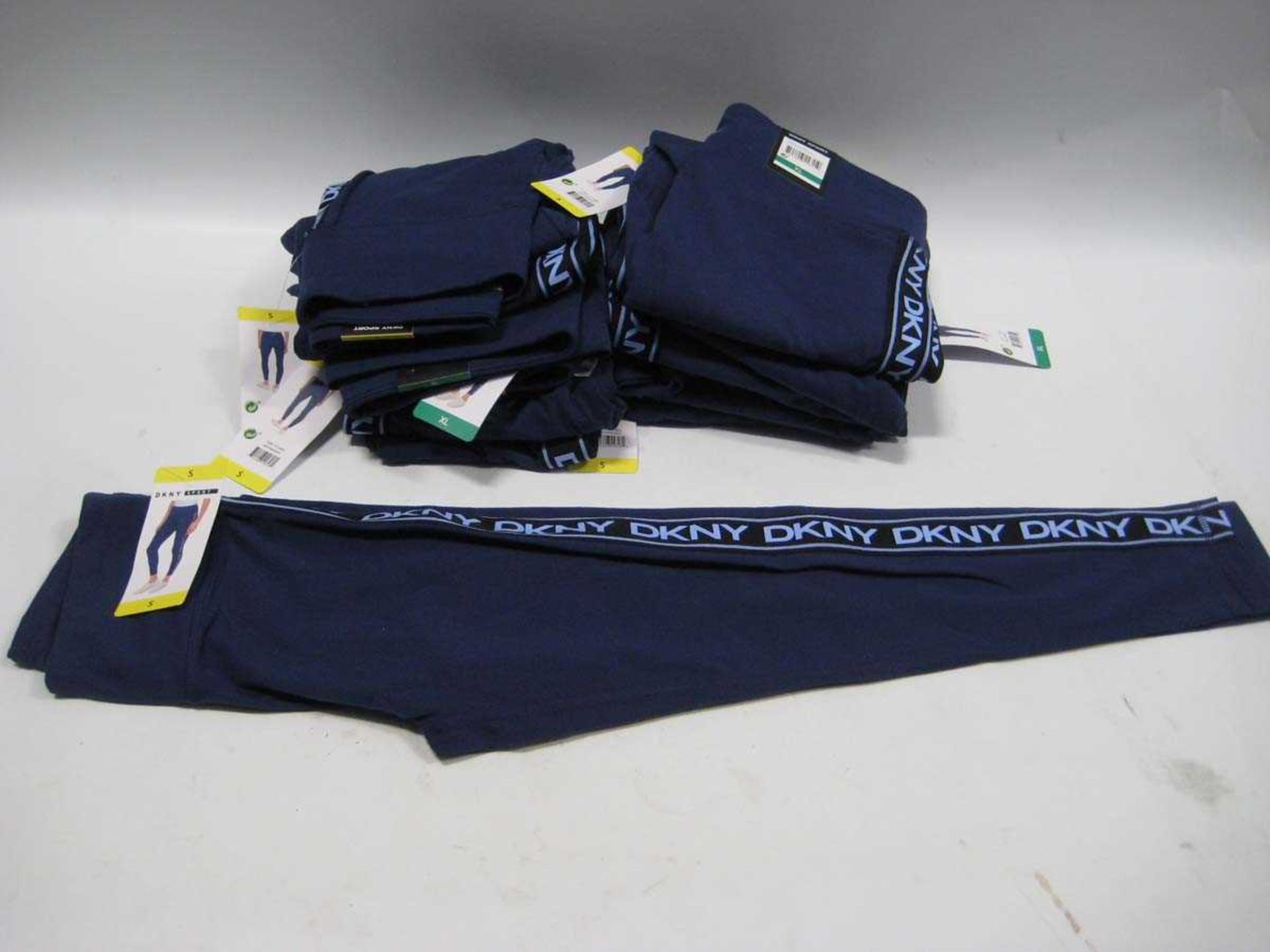 +VAT A bag containing 12x Ladies Navy DKNY Leggings in various sizes.
