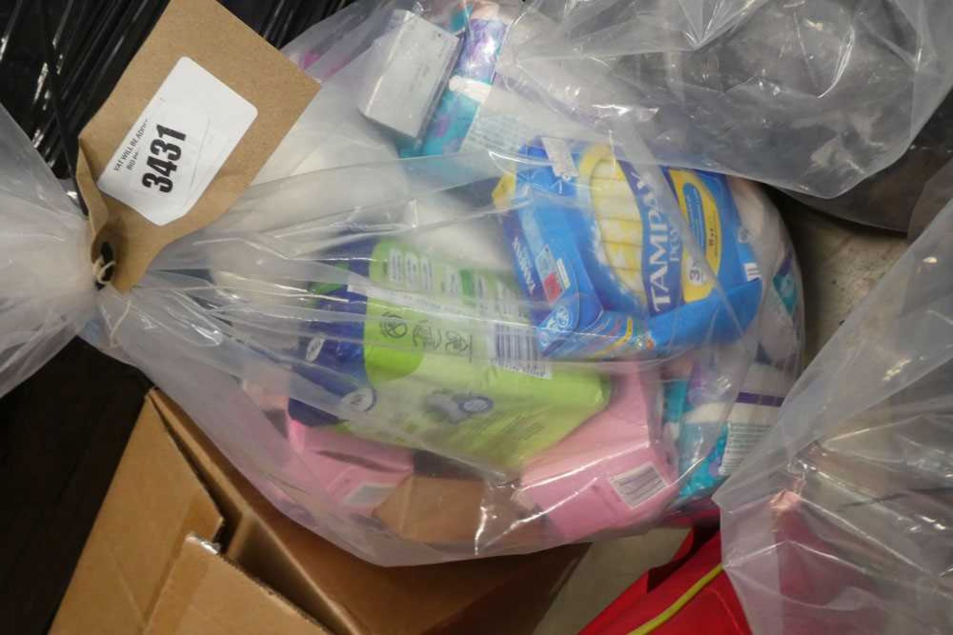 +VAT A bag containing sanitary towels, condoms and face wipes - Image 2 of 2