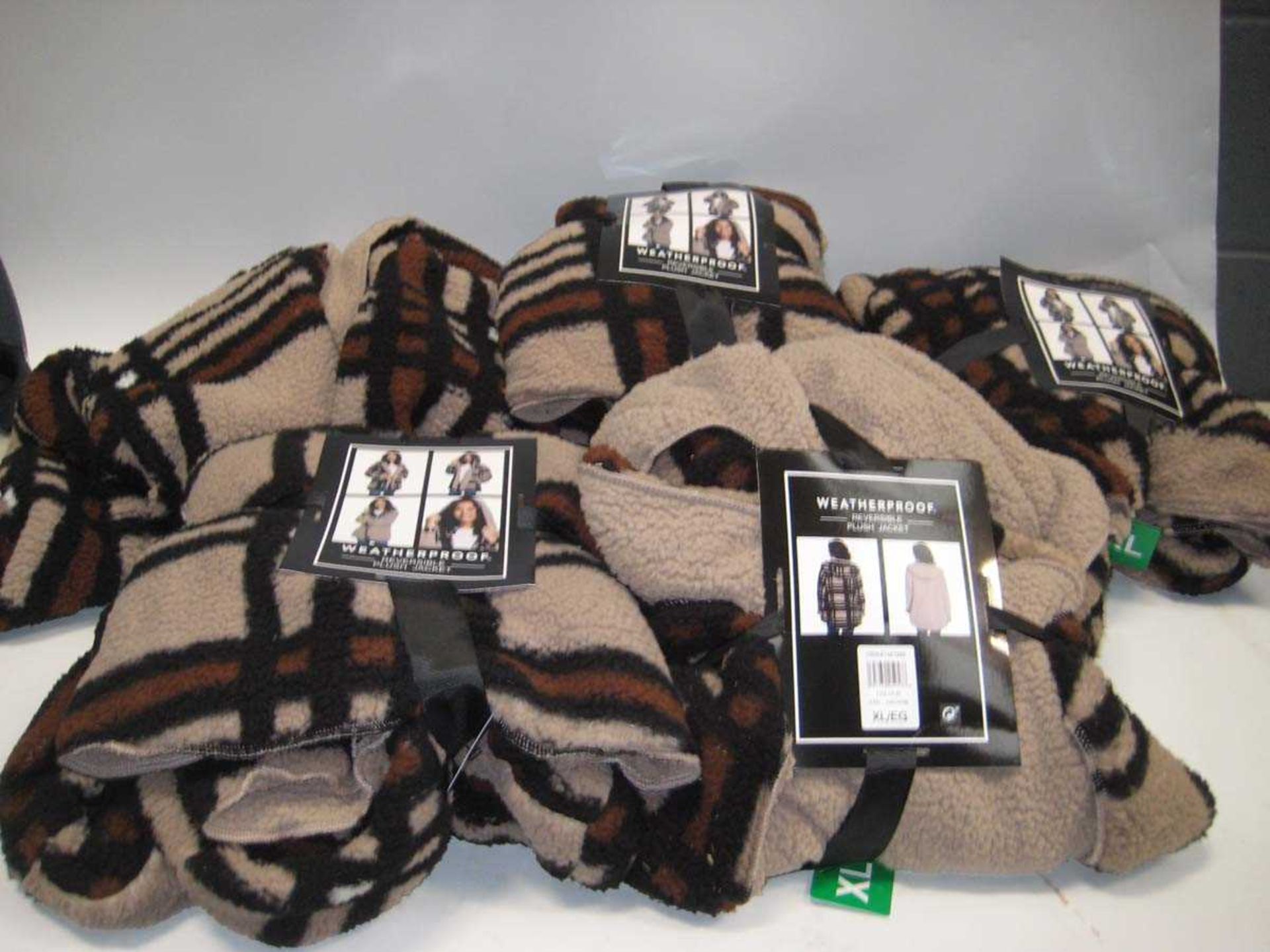 +VAT A bag containing 5x Weatherproof Reversible Plush Jackets in various sizes