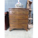 Bow fronted mahogany chest of 4 drawers with slide over