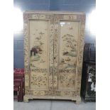 Cream painted oriental double door cupboard