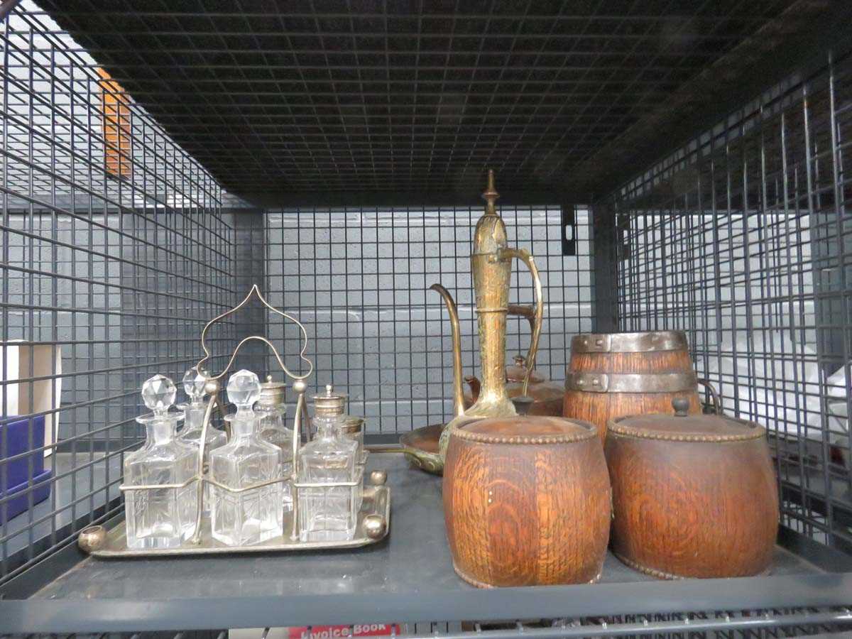 Cage containing a cruet set, tobacco barrels and 2 brass and copper teapots