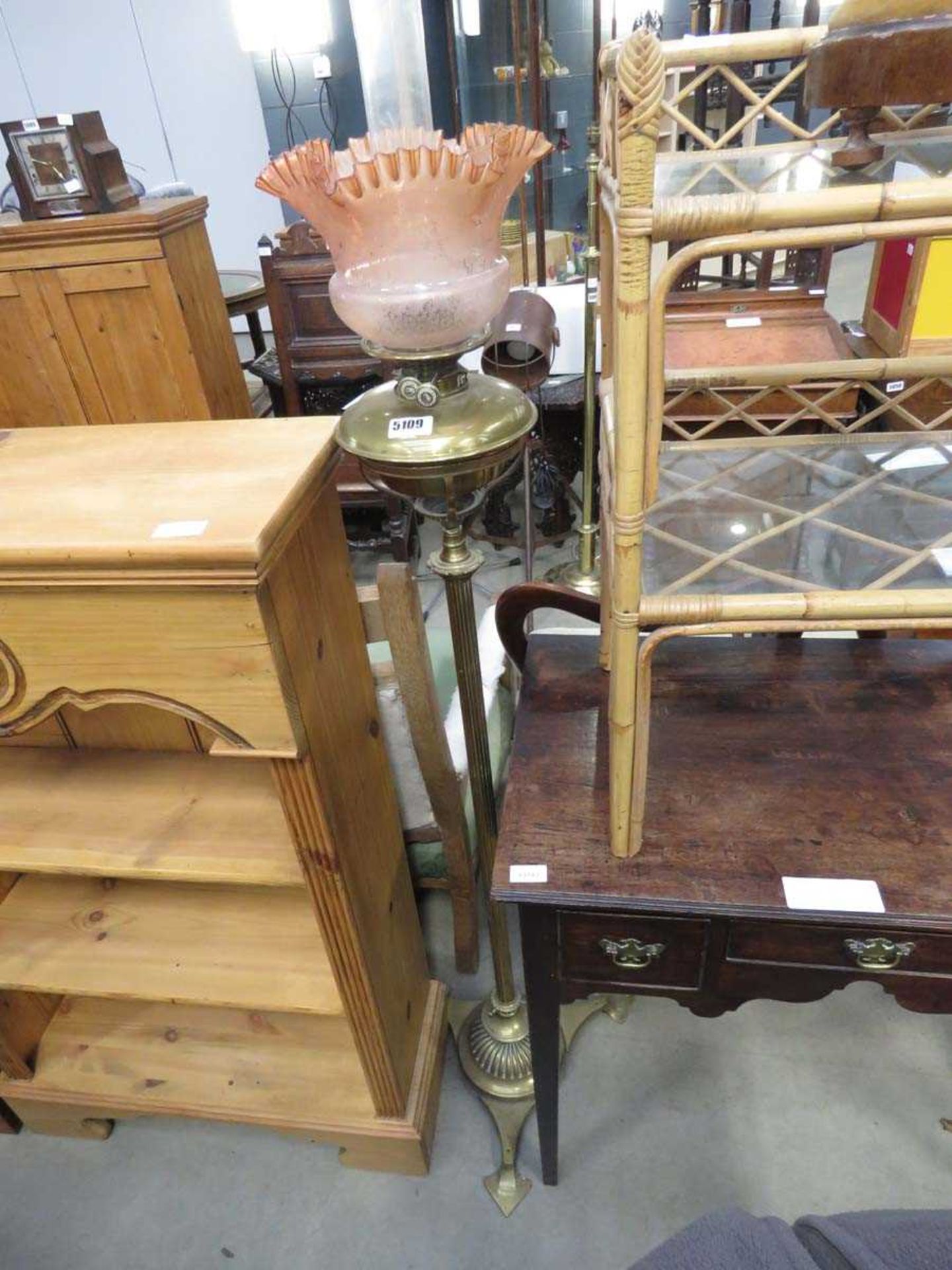 Brass floor lamp with glass shade