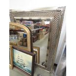 +VAT (9) Rectangular mirror in decorative silver painted frame