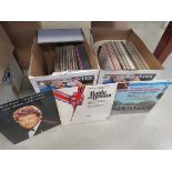 Two boxes containing vinyl records