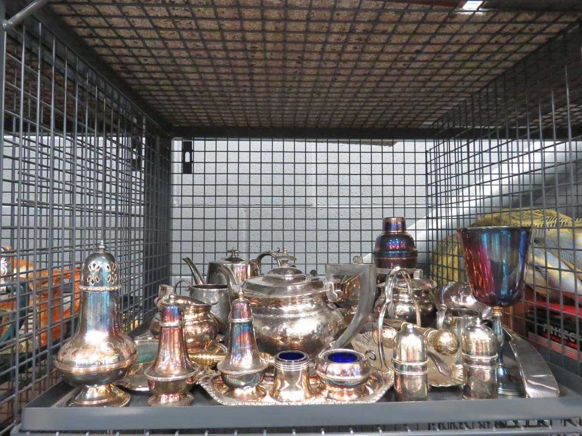 Cage containing large quantity of silver plate to include tea service, cocktail shaker plus cruet