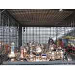 Cage containing large quantity of silver plate to include tea service, cocktail shaker plus cruet