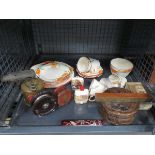 Cage containing fishing reels, blow torch, floral patterned crockery, spirit level and lidded wooden