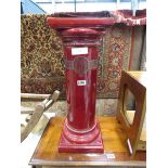 Maroon glazed plant stand