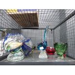 Cage containing glass figures and bowls