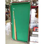 Pool table with 3 cues