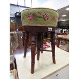 Adjustable piano stool with embroidered seat