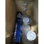 Box containing decanters