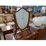 Shield shaped regency style toilet mirror