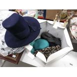 Box containing ladies hats