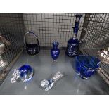 Cage containing paperweights, ornaments, decanter and vases