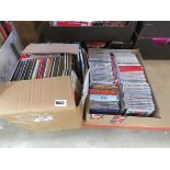 Two boxes containing CD's