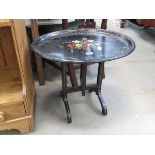 Ebonised and floral decorated folding side table