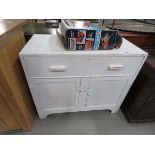 White painted double door cupboard with drawer over