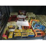 Cage containing boxed matchbox and models of Yesteryear Diecast cars