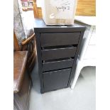 Narrow dark wood filing cabinet