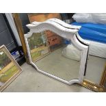 Bevelled mirror in cream frame