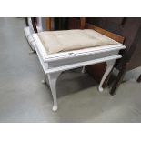 Piano stool with hinged seat
