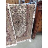 (10) Beige and cream woollen mat