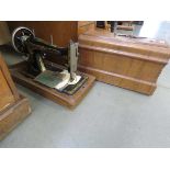 Cased singer sewing machine