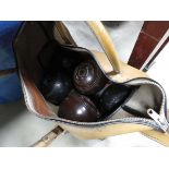 Bag containing quantity of lawn bowls