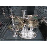 Cage containing candlesticks and various silver plated dishes