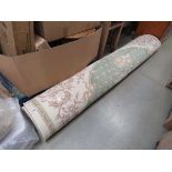 Large green and cream Chinese carpet