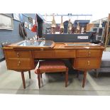 Bedroom dressing table with mirrors and stool