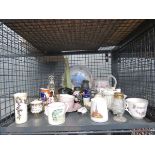 Cage containing souvenir pottery, mugs, vases and collectors plate