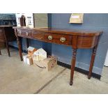 A 19th century mahogany and strung serving table of rounded form, the two drawers bearing labels for