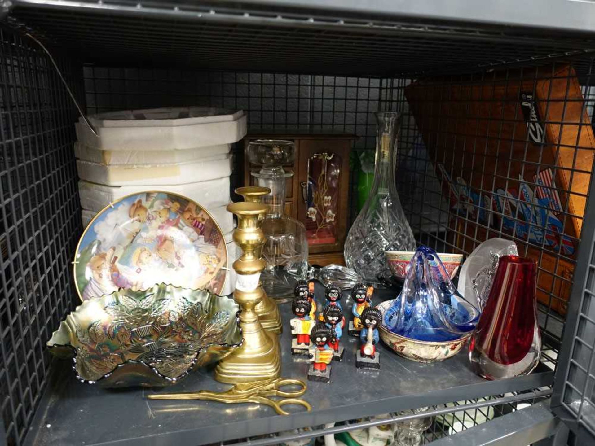 Cage containing collectors plates, carnival glass, brass candlesticks, decanters and gollies